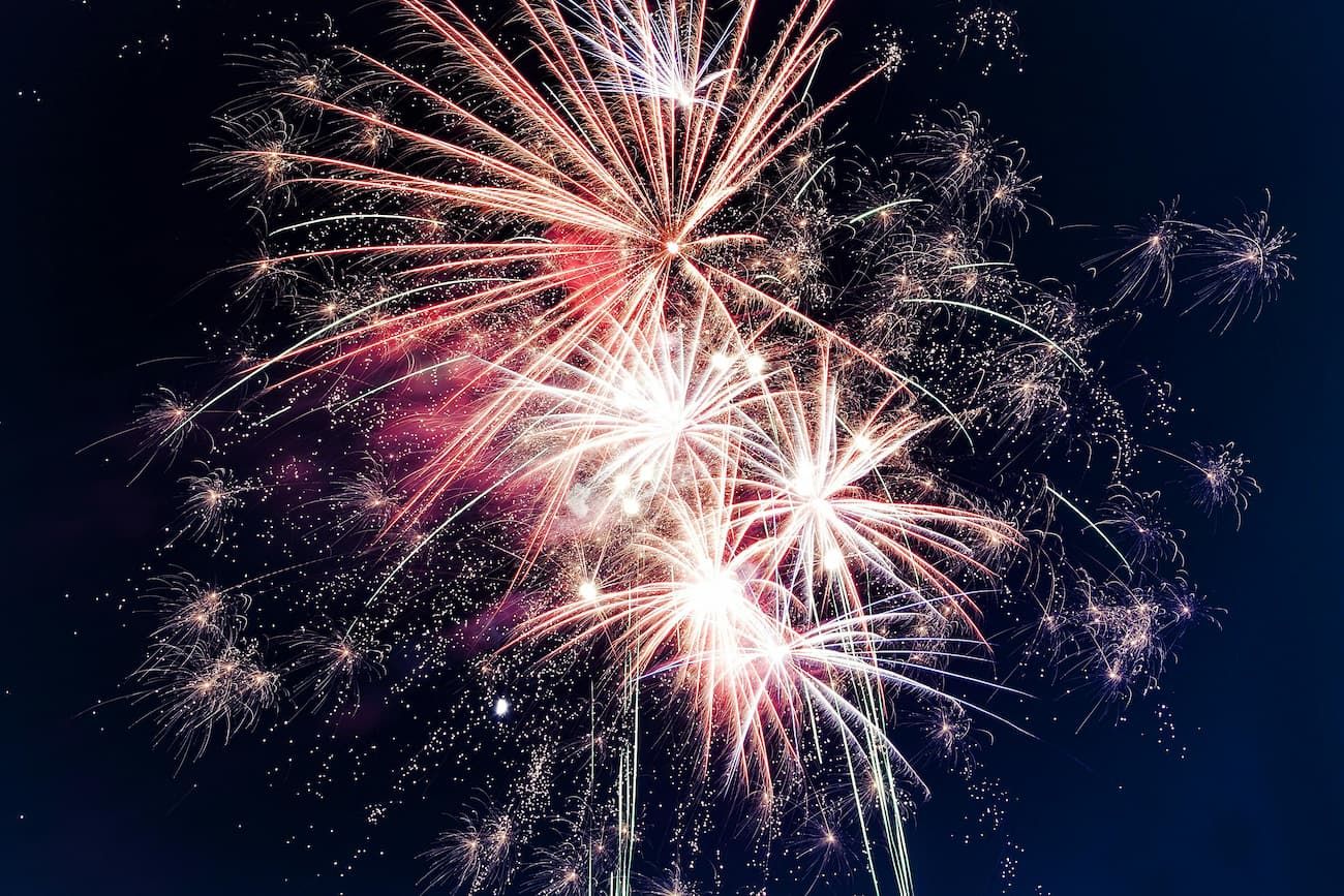 Fireworks over a city at night